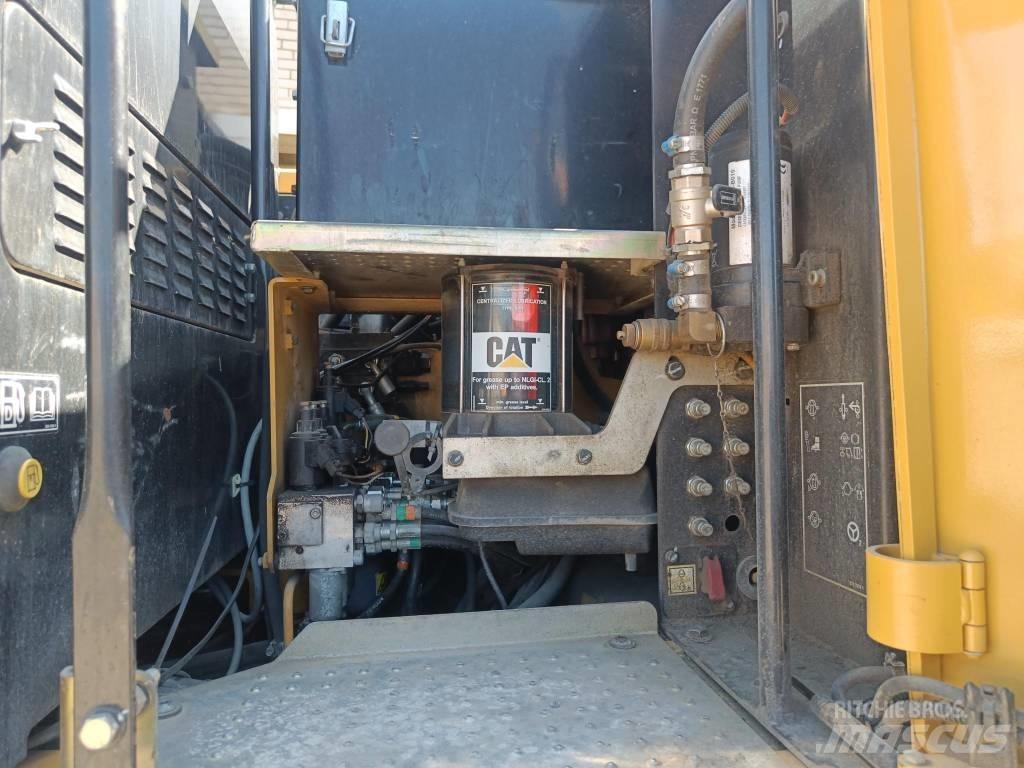 CAT M 315 D Pelle sur pneus