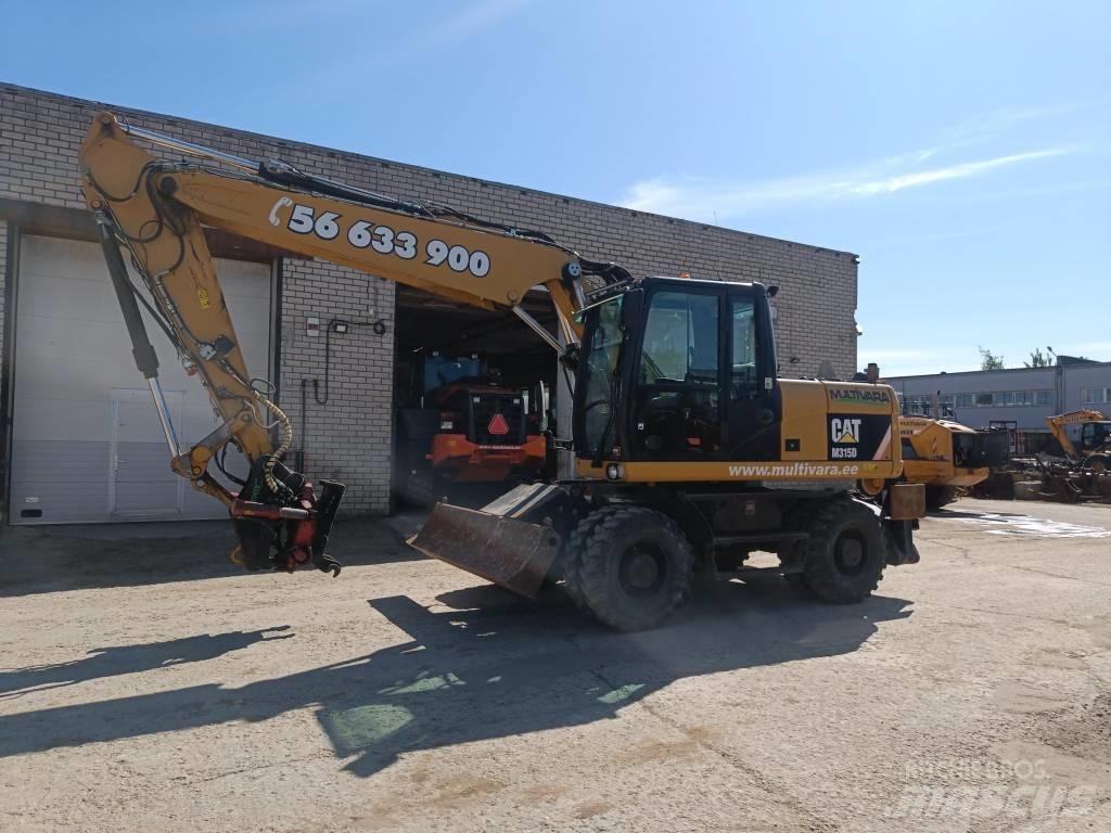 CAT M 315 D Pelle sur pneus
