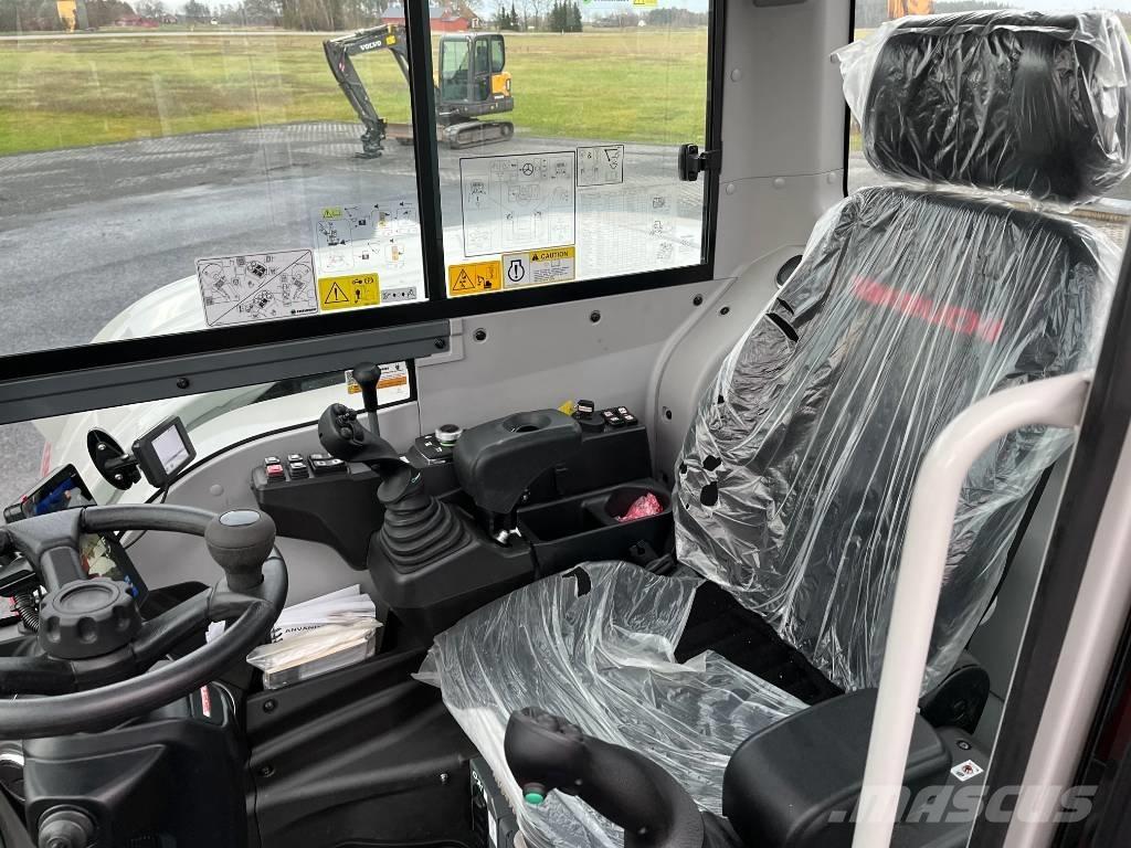 Takeuchi TB 395 W Pelle sur pneus