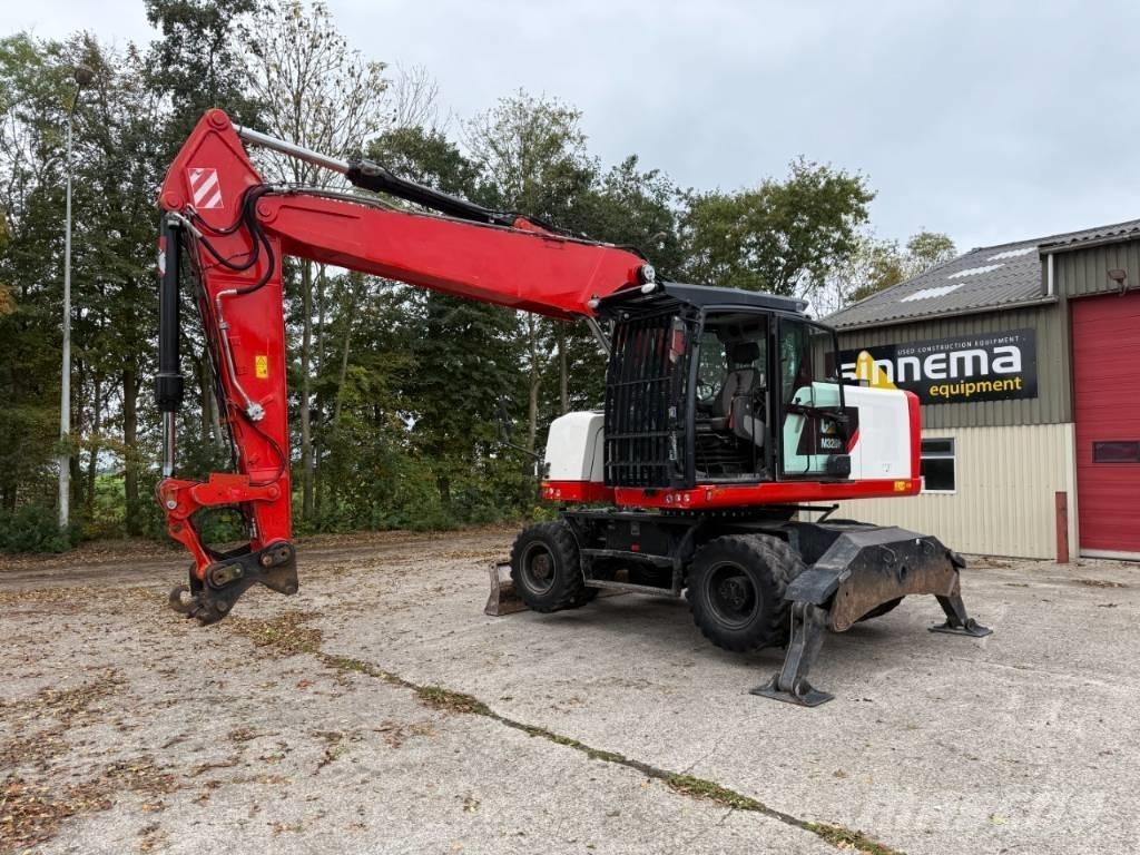 CAT M320F Pelle sur pneus