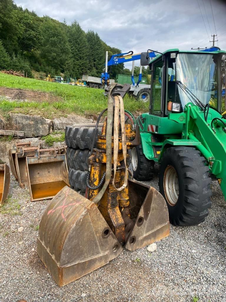Hitachi ZX 140 W-3 Pelle sur pneus