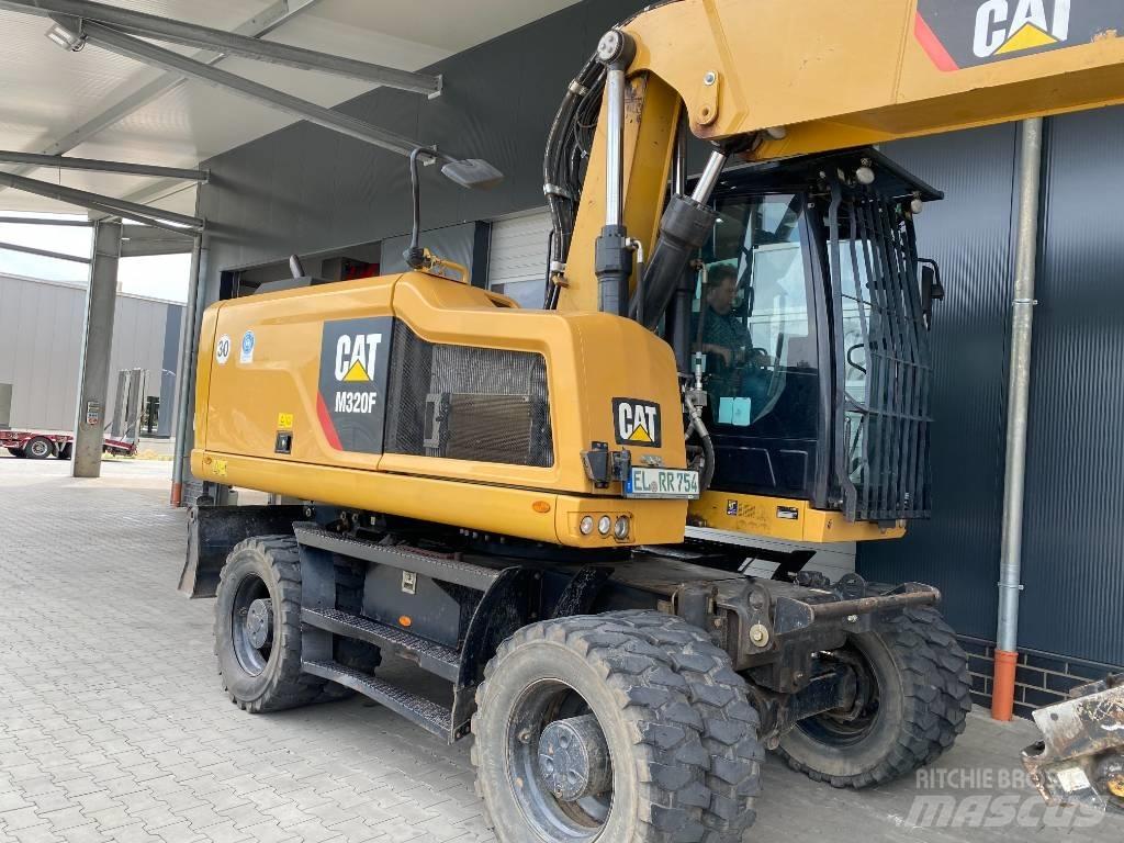 CAT M 320 F Pelle sur pneus