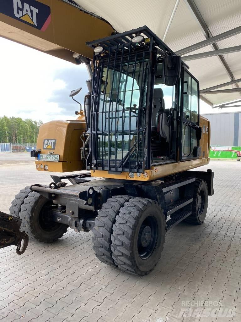 CAT M 320 F Pelle sur pneus