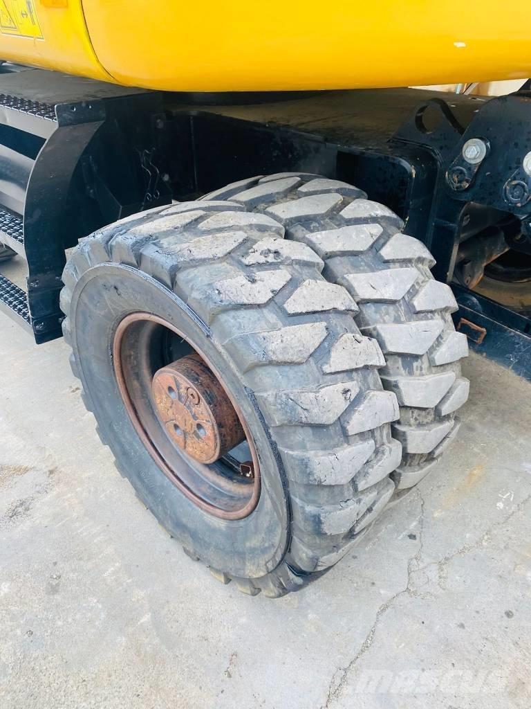 CAT m317f Pelle sur pneus