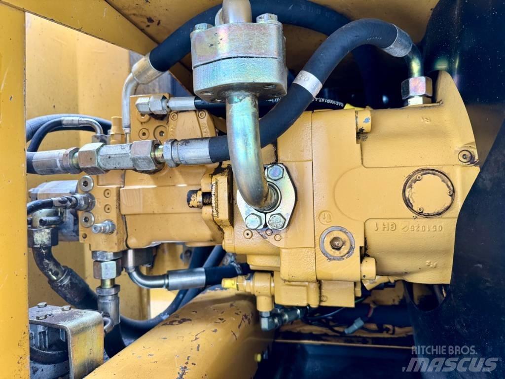 CAT M 316 C Pelle sur pneus