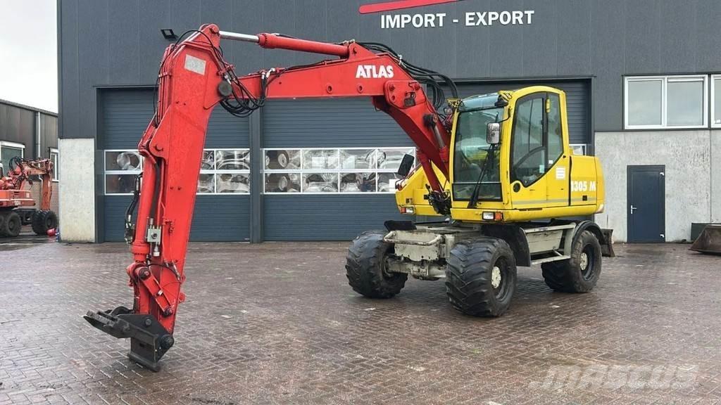 Atlas 1305 Pelle sur pneus