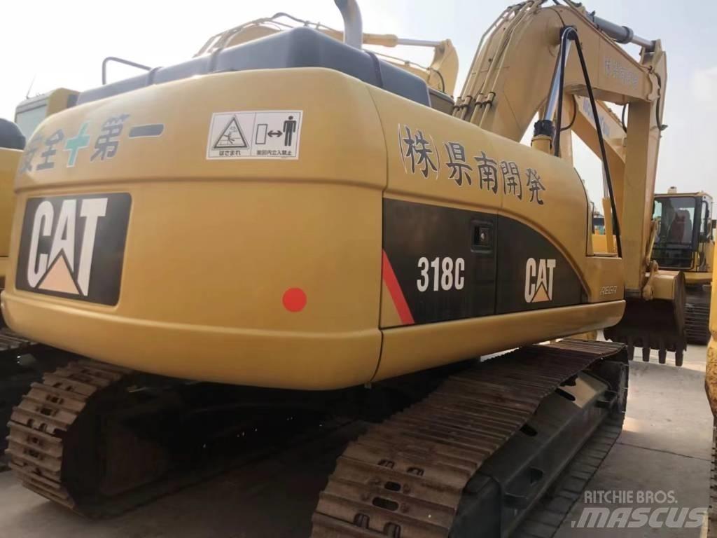 CAT 318C Pelle sur chenilles