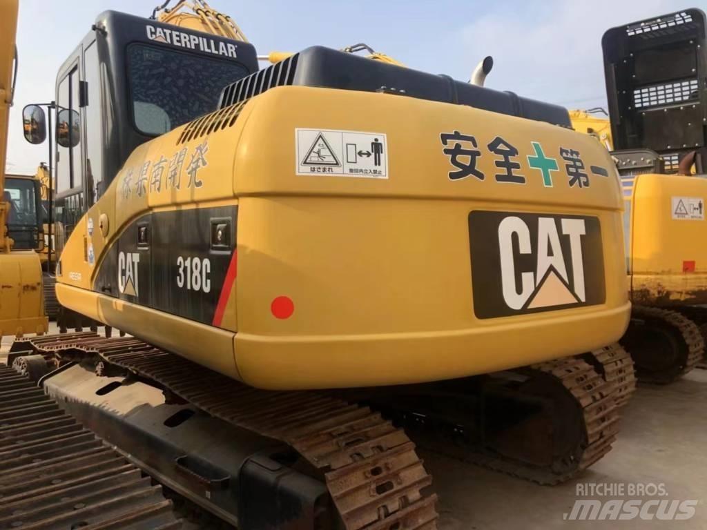 CAT 318C Pelle sur chenilles