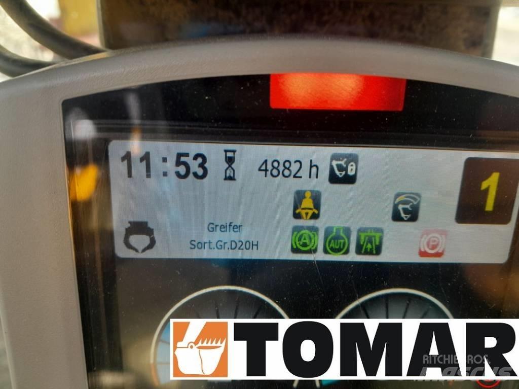 CAT M 314 F Pelle sur pneus