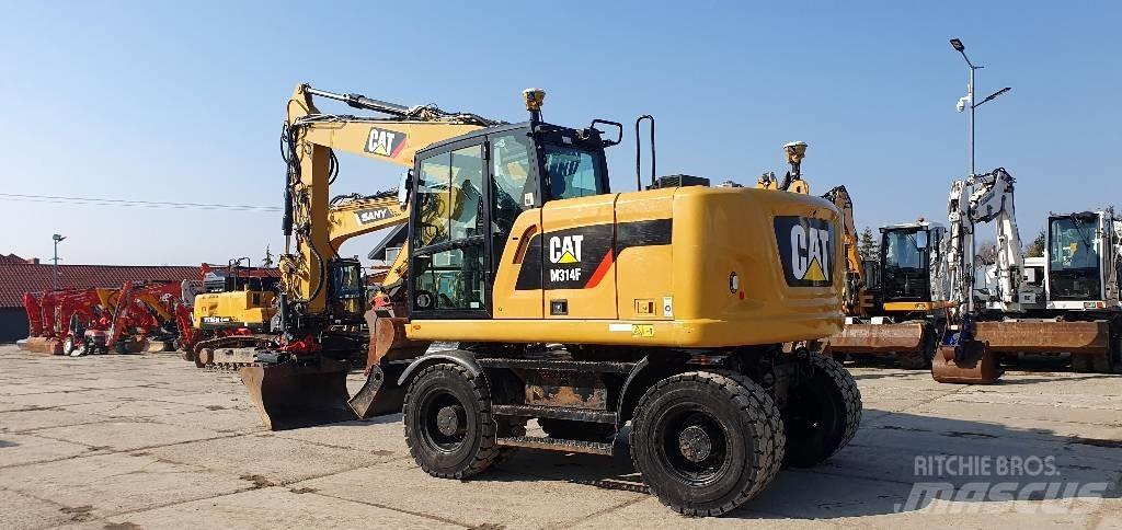 CAT M314 F Pelle sur pneus