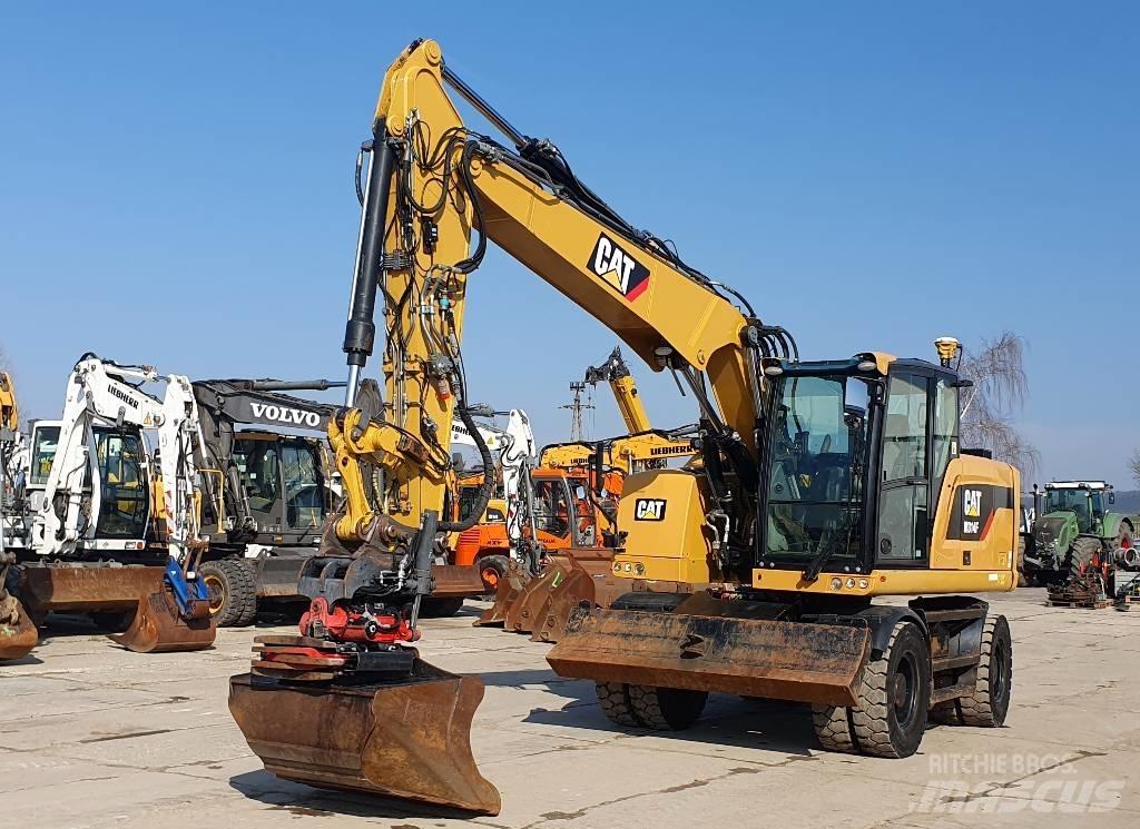 CAT M314 F Pelle sur pneus