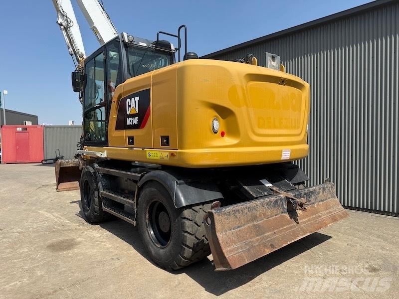 CAT M314F Pelle sur pneus