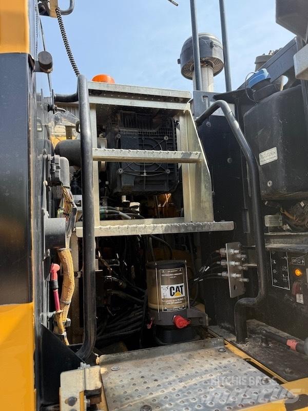 CAT M314F Pelle sur pneus