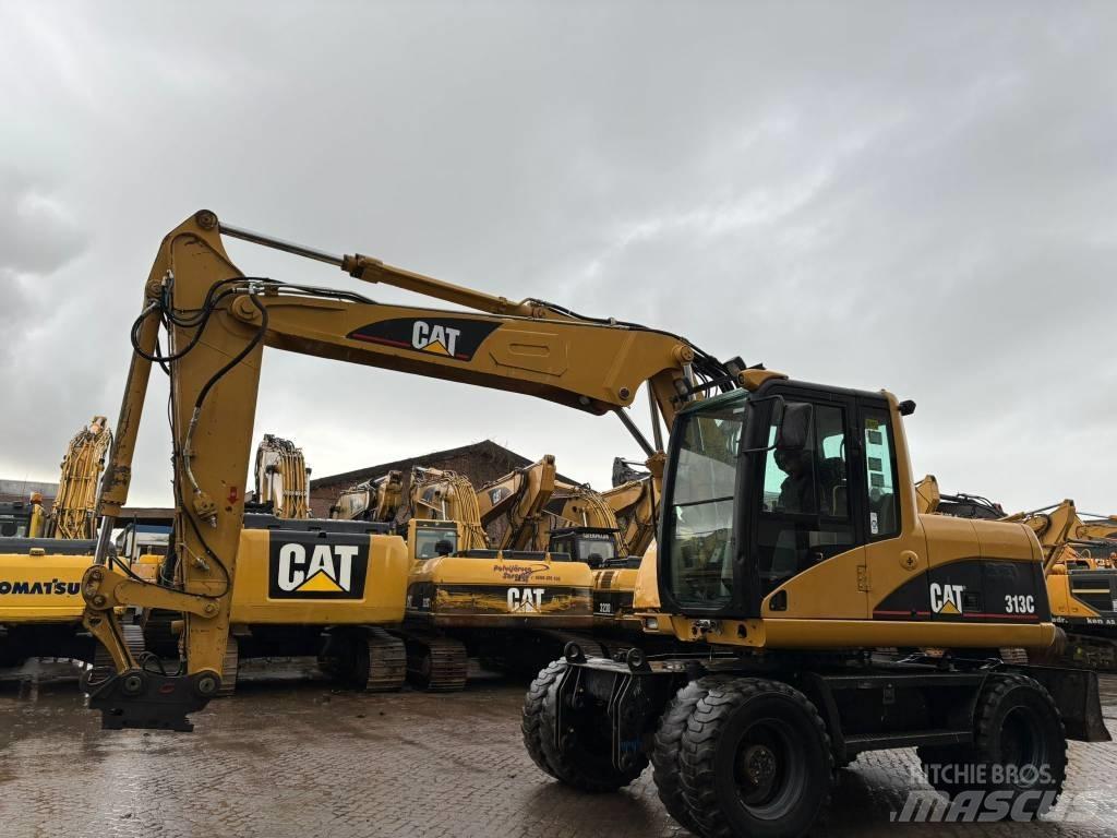 CAT M 313 C Pelle sur pneus