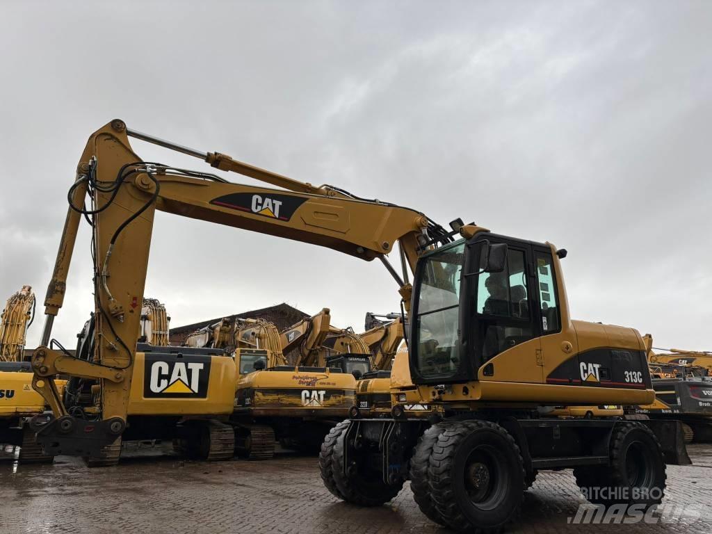 CAT M 313 C Pelle sur pneus