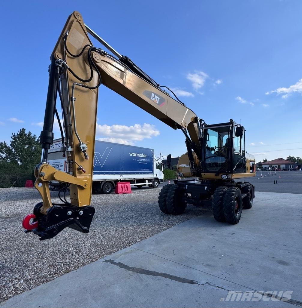 CAT 316 D Pelle sur pneus