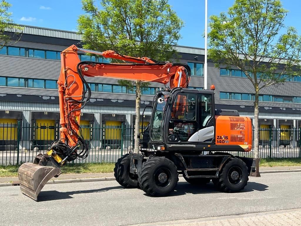Hitachi ZX 140 W-5 Pelle sur pneus