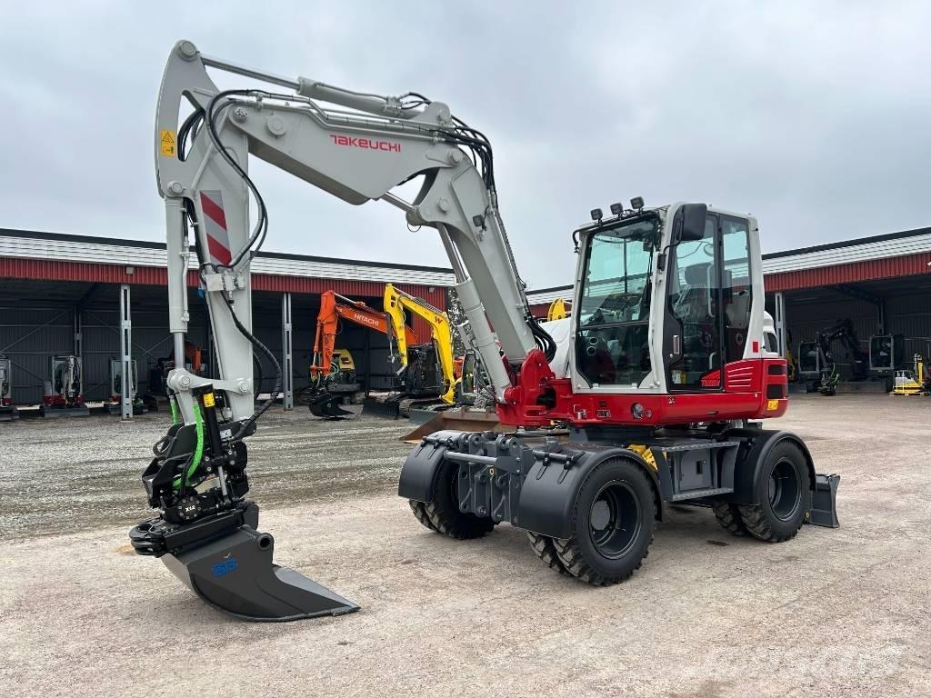 Takeuchi TB395W Pelle sur pneus