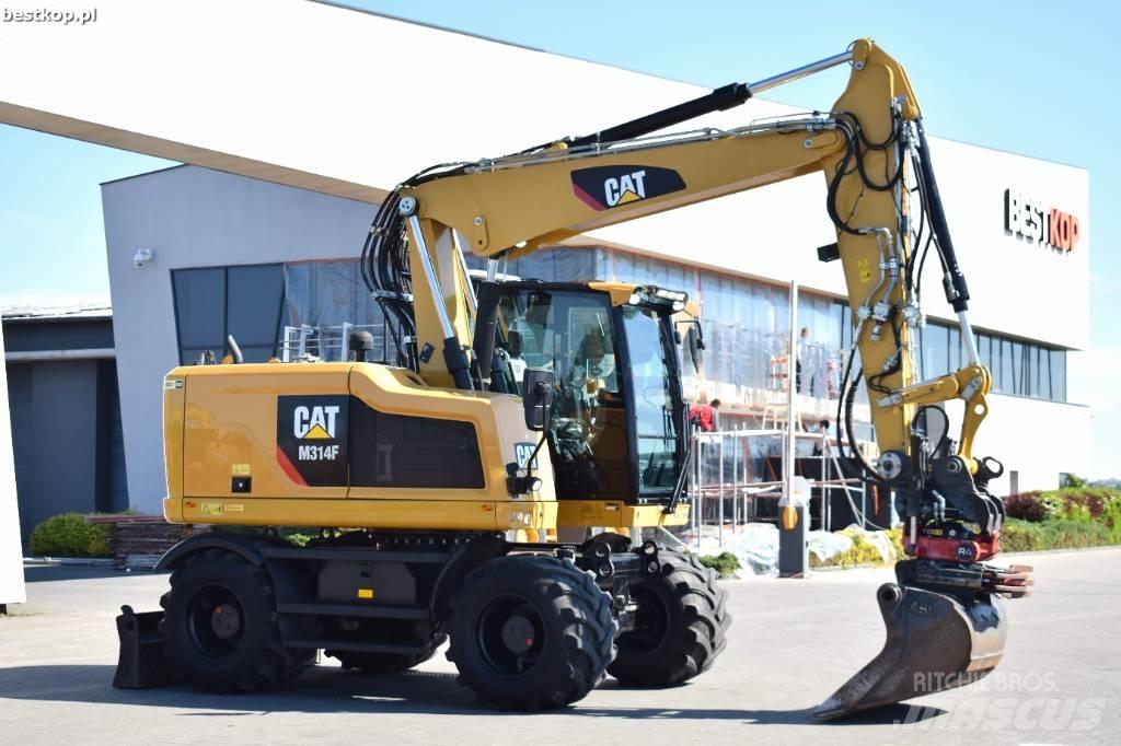 CAT M314F Pelle sur pneus