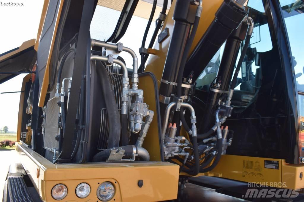 CAT M314F Pelle sur pneus