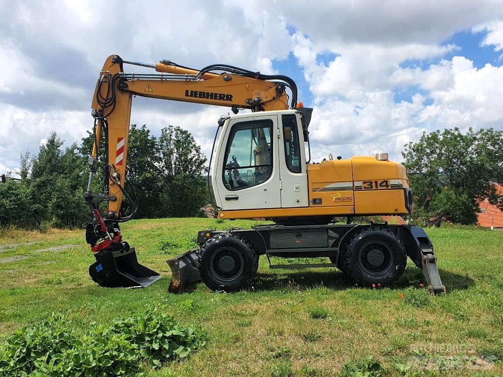 Liebherr A314 Pelle sur pneus
