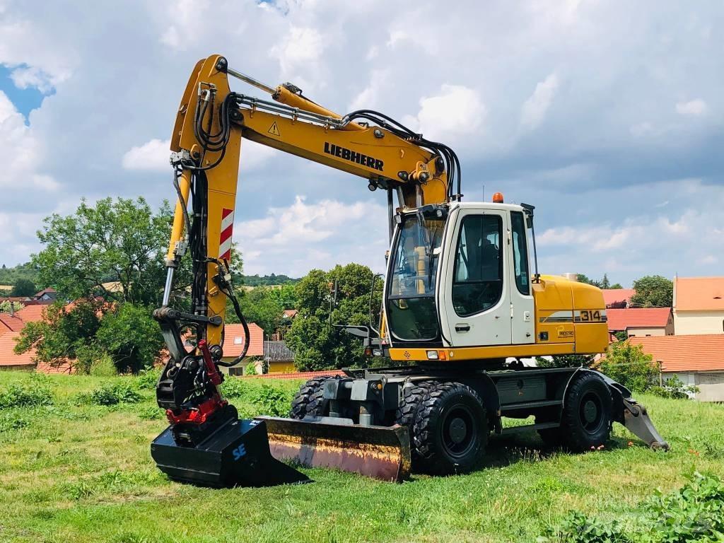 Liebherr A314 Pelle sur pneus