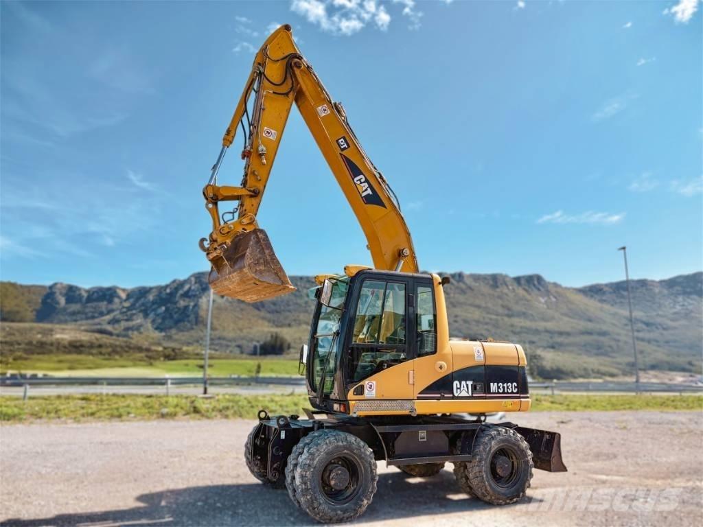 CAT M 313 C Pelle sur pneus
