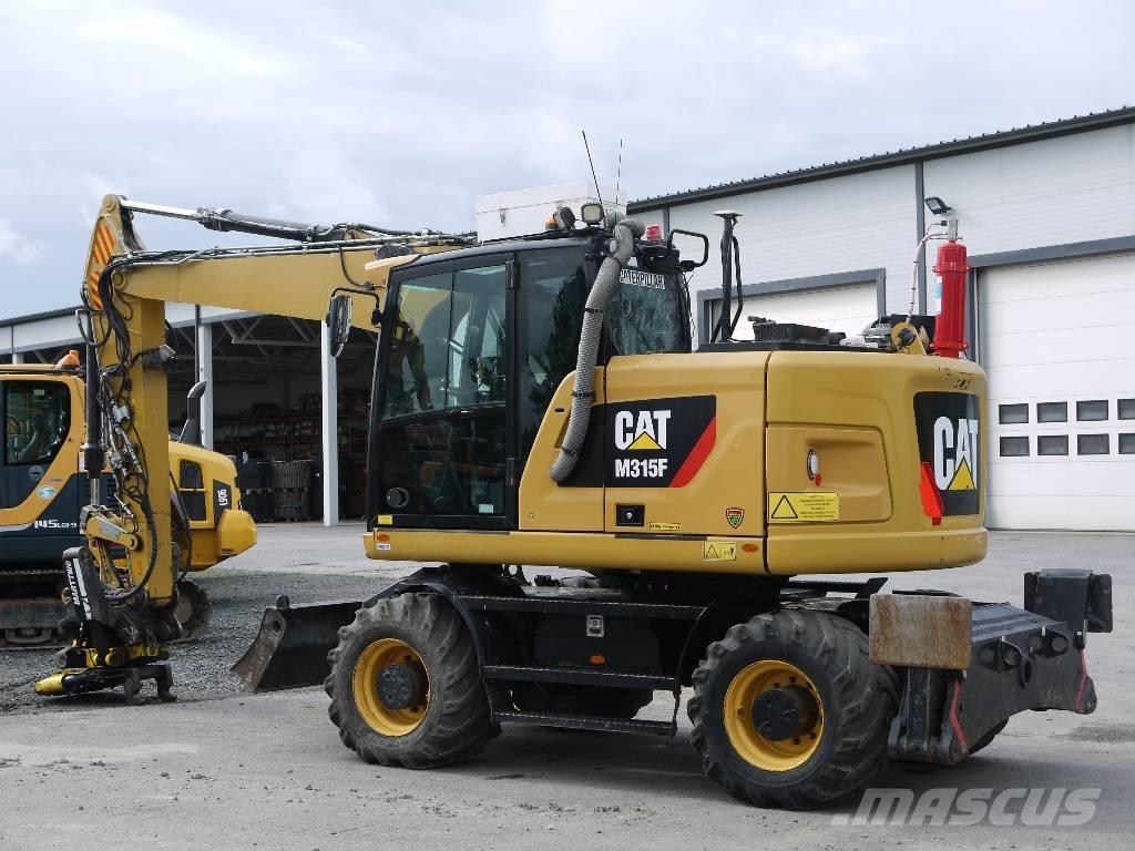 CAT M 315 F Pelle sur pneus