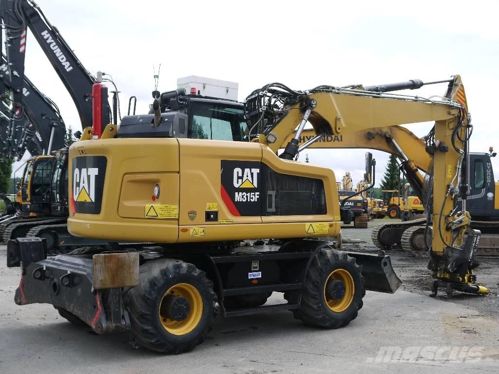 CAT M 315 F Pelle sur pneus