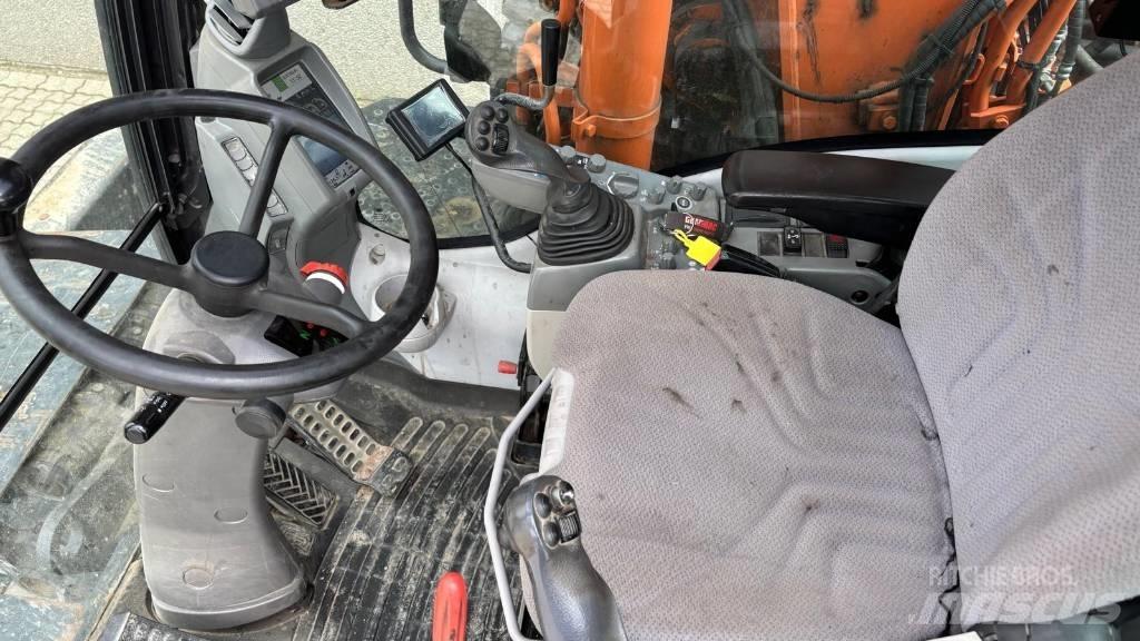 Hitachi ZX 140 W-5 Pelle sur pneus