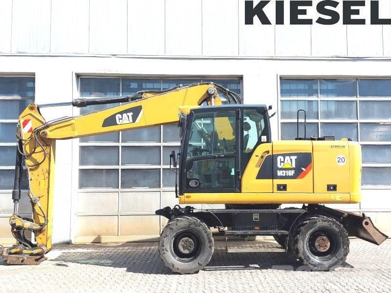 CAT M 316 F Pelle sur pneus