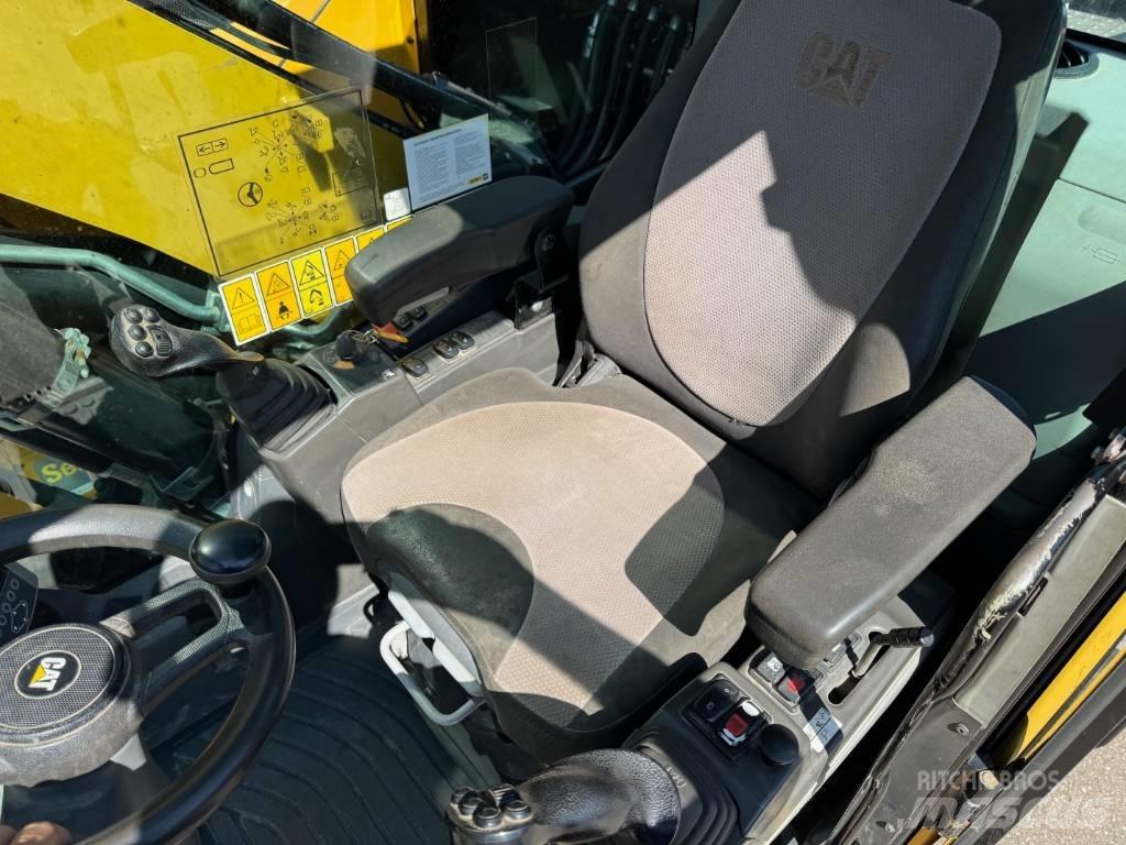 CAT M 315 F Pelle sur pneus