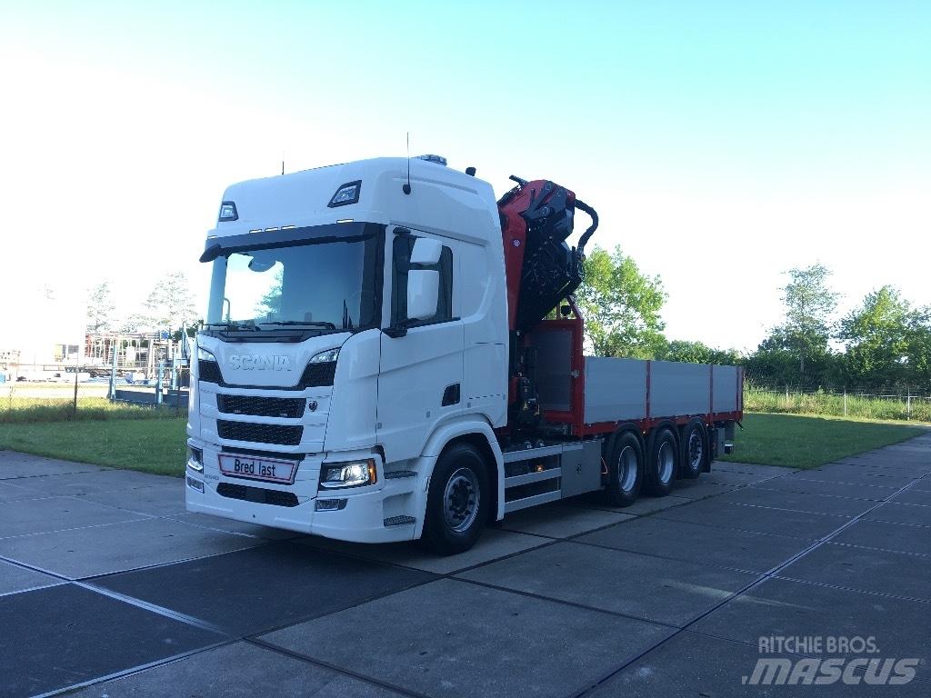 Scania R 560 Camion plateau ridelle avec grue