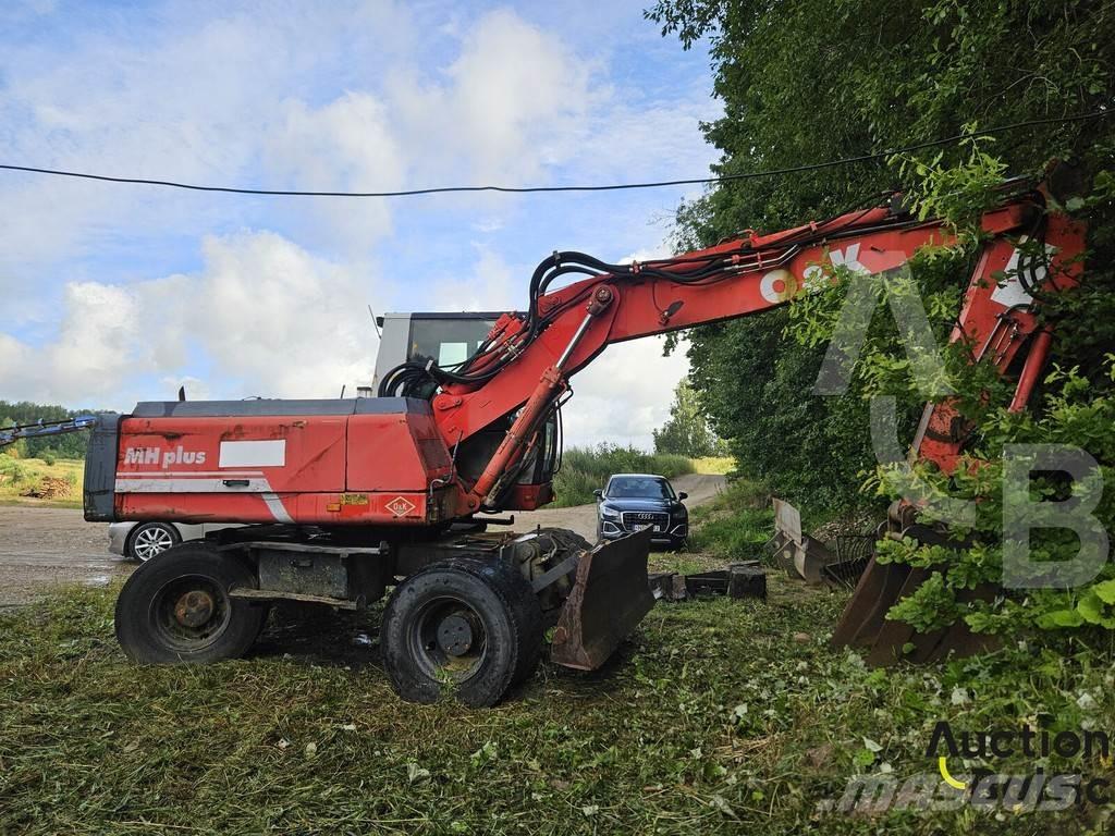 O&K MH 5 Pelle sur pneus