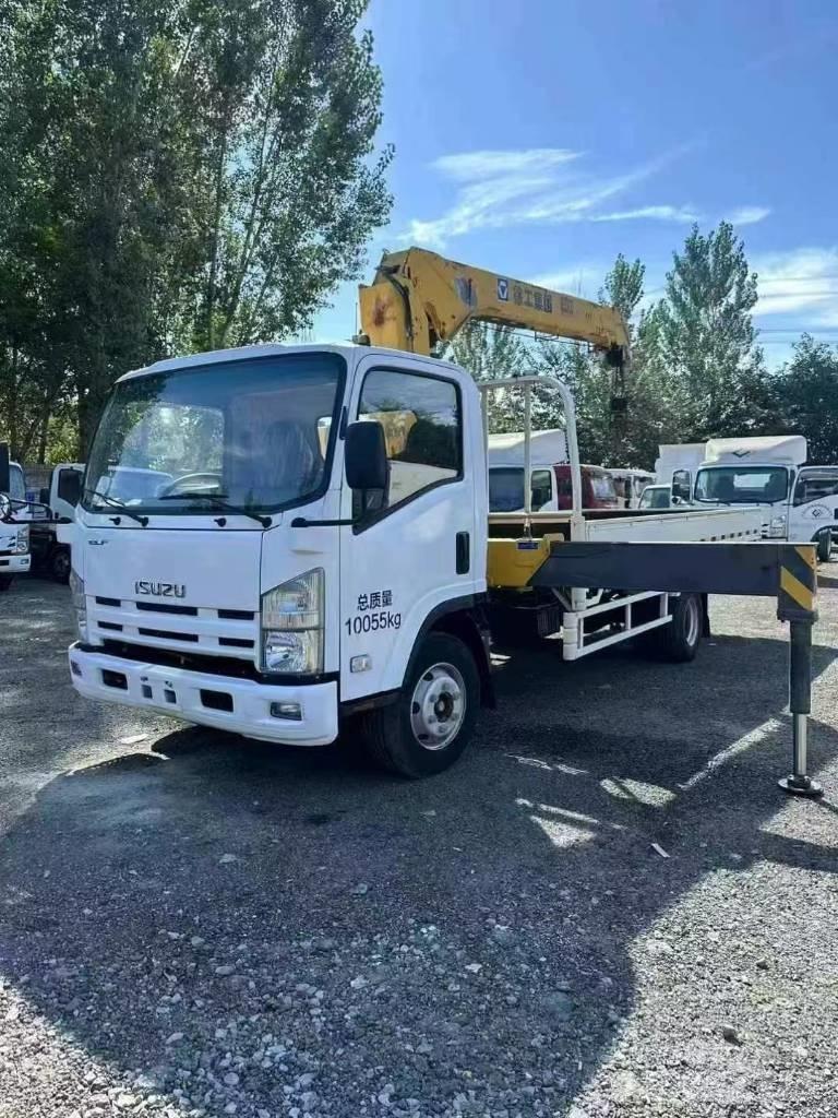 Isuzu ELF 700 Camion plateau ridelle avec grue