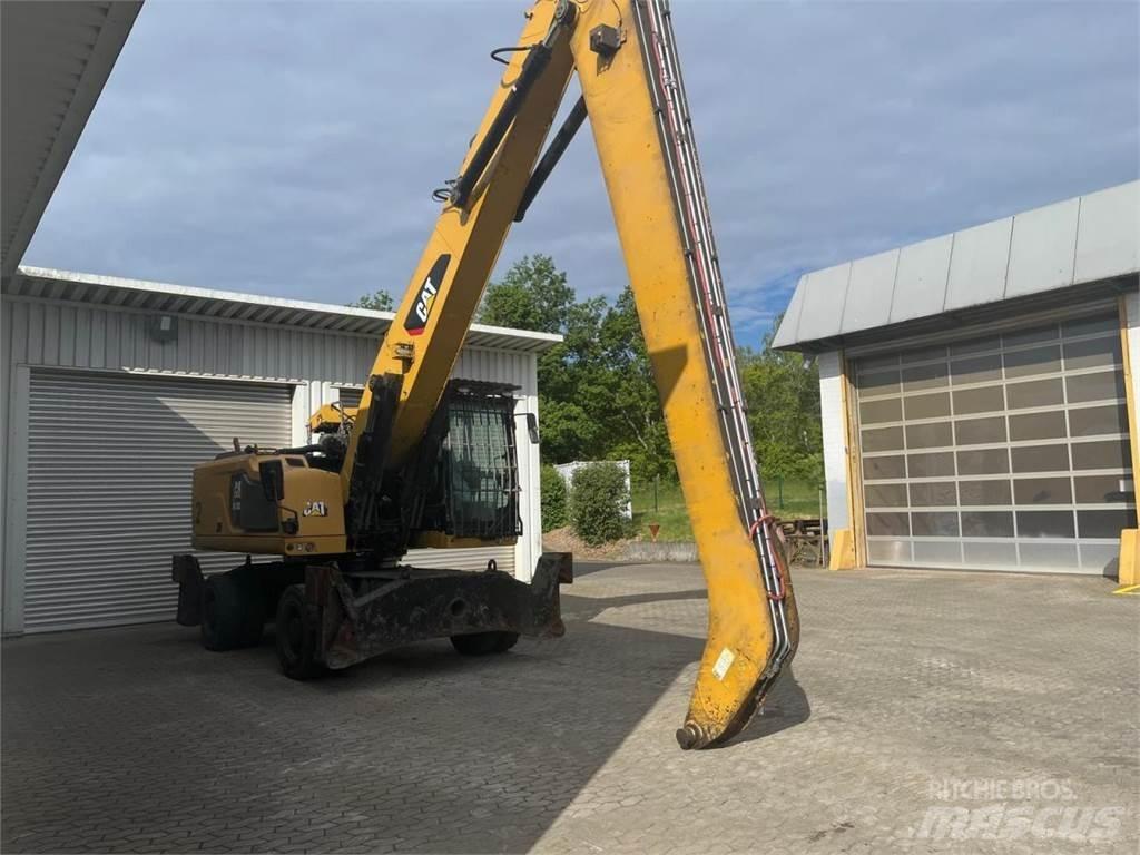 CAT MH3026 Pelle sur pneus