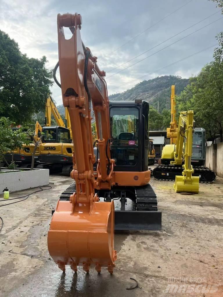 CASE CX 55 B Pelle sur chenilles