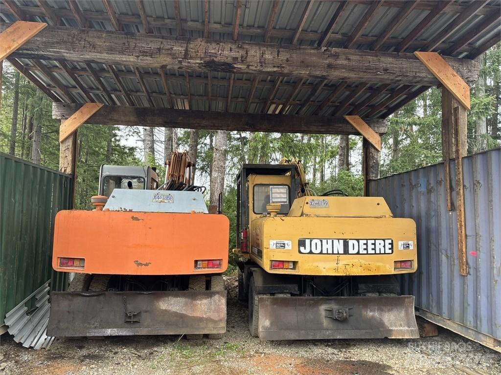 DEERE 595D Pelle sur pneus