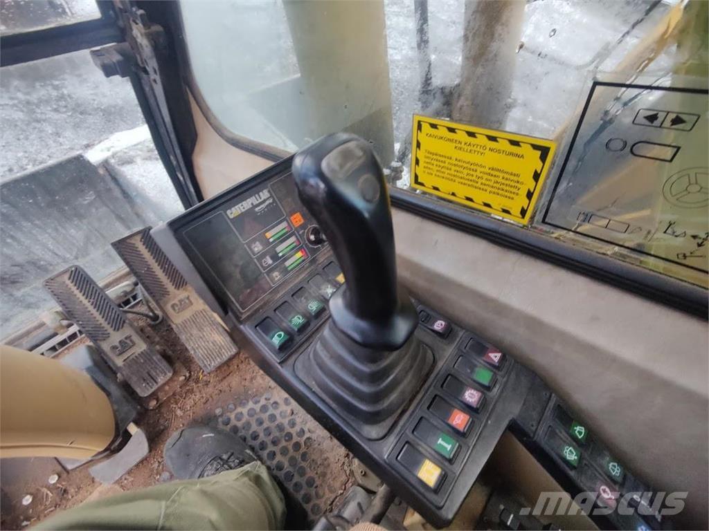 CAT M315 Pelle sur pneus