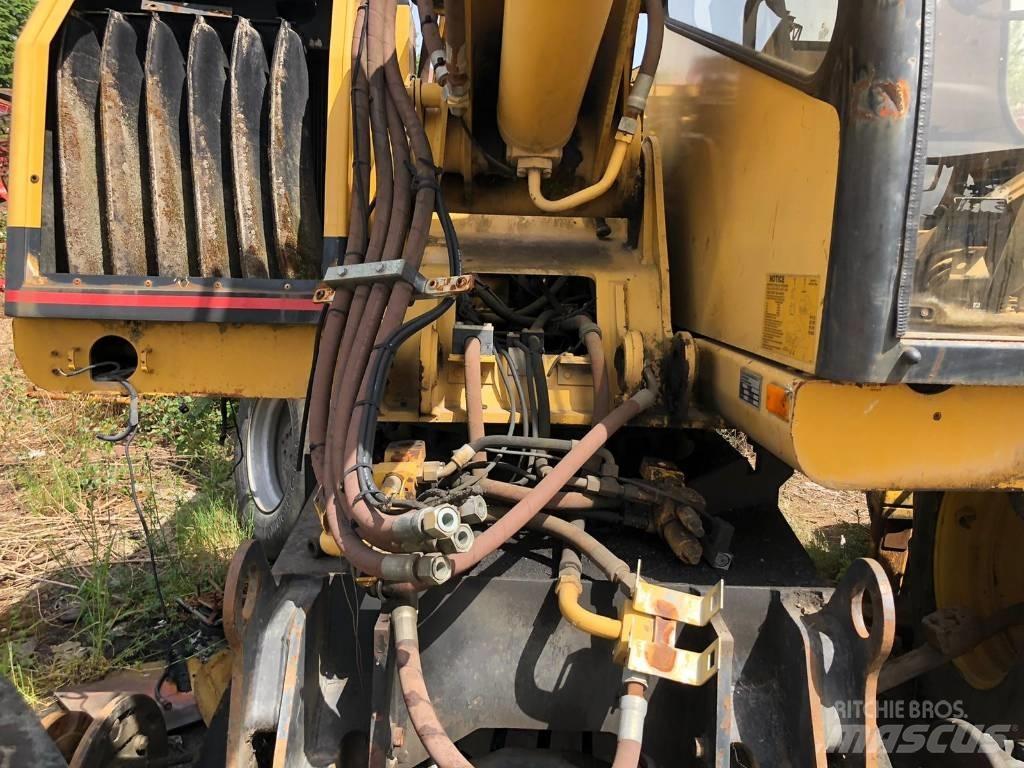 CAT M 312 FOR PARTS Pelle sur pneus