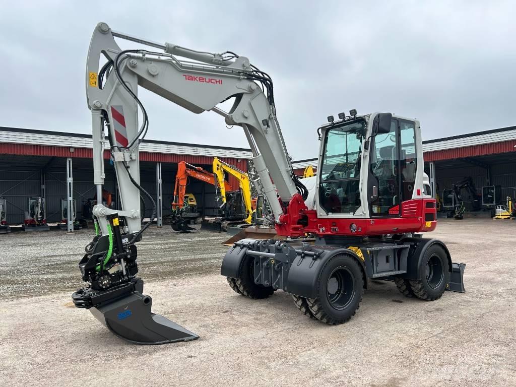 Takeuchi TB395W Pelle sur pneus