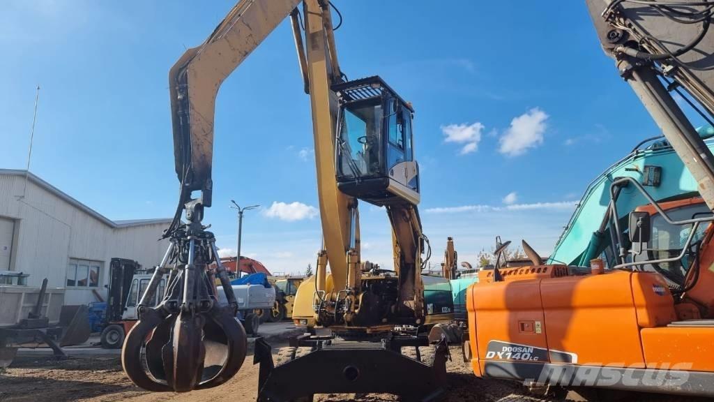 CAT M 322 C MH Pelle à déchets