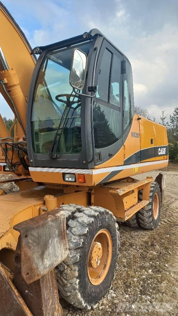 CASE WX 210 Pelle sur pneus