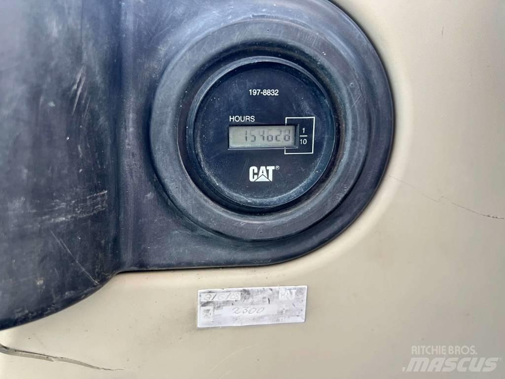CAT M316C Pelle sur pneus