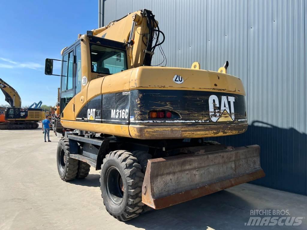 CAT M316C Pelle sur pneus