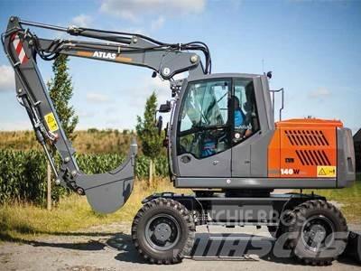 Atlas 140W Pelle sur pneus