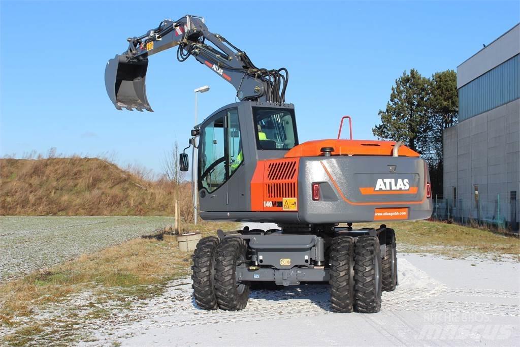 Atlas 140W Pelle sur pneus