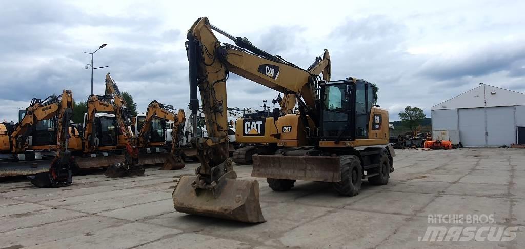 CAT M316F Pelle sur pneus