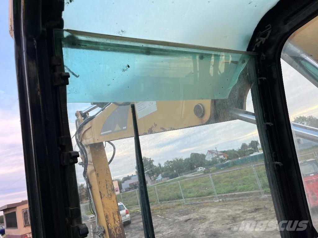 CAT M 316 C Pelle sur pneus