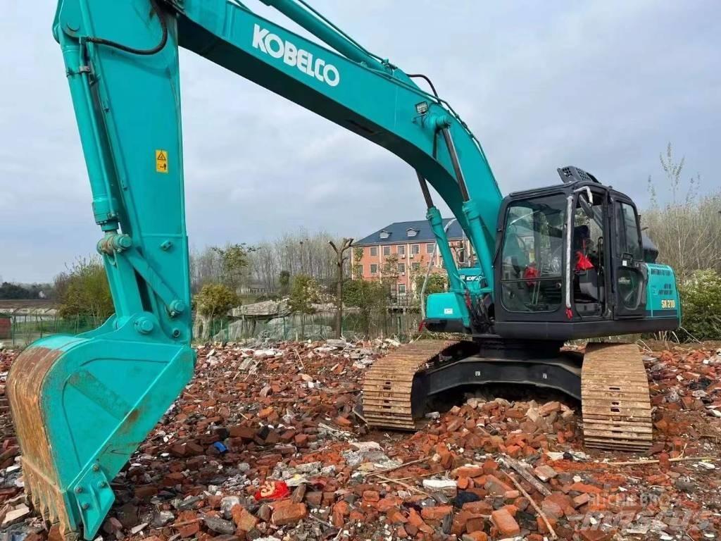 Kobelco SK210 Pelle sur chenilles
